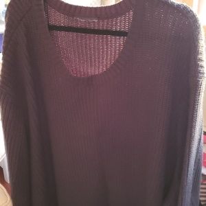 Sz 5x woman within black crew neck sweater.